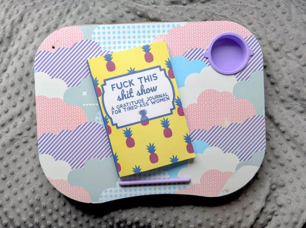 Colorful lap desk with gratitude journal